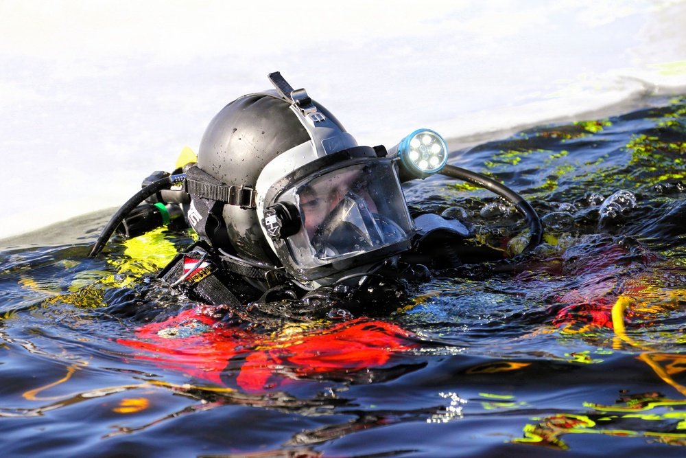 Fort McCoy DES Fire Department dive team holds February rescue training under ice