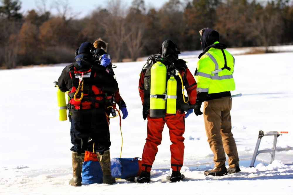 Fort McCoy DES Fire Department dive team holds February rescue training under ice