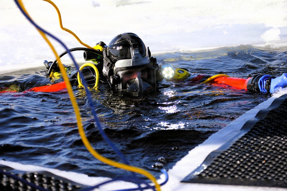Fort McCoy DES Fire Department dive team holds February rescue training under ice