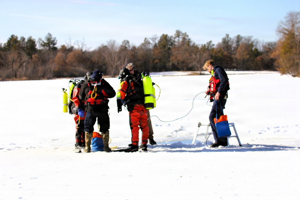 Fort McCoy DES Fire Department dive team holds February rescue training under ice