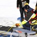 Fort McCoy DES Fire Department dive team holds February rescue training under ice