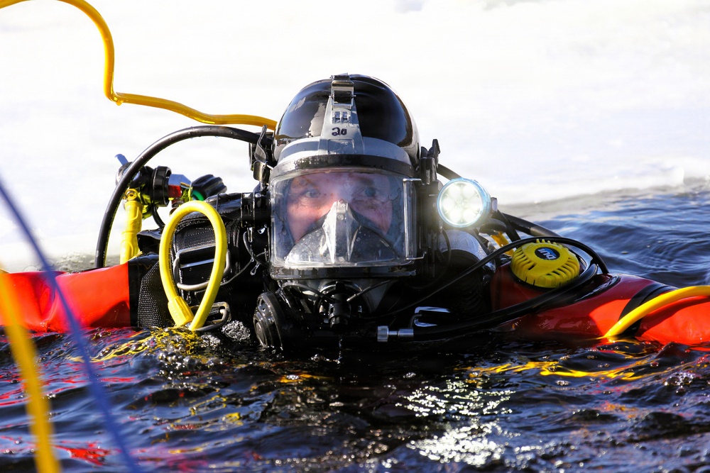 Fort McCoy DES Fire Department dive team holds February rescue training under ice