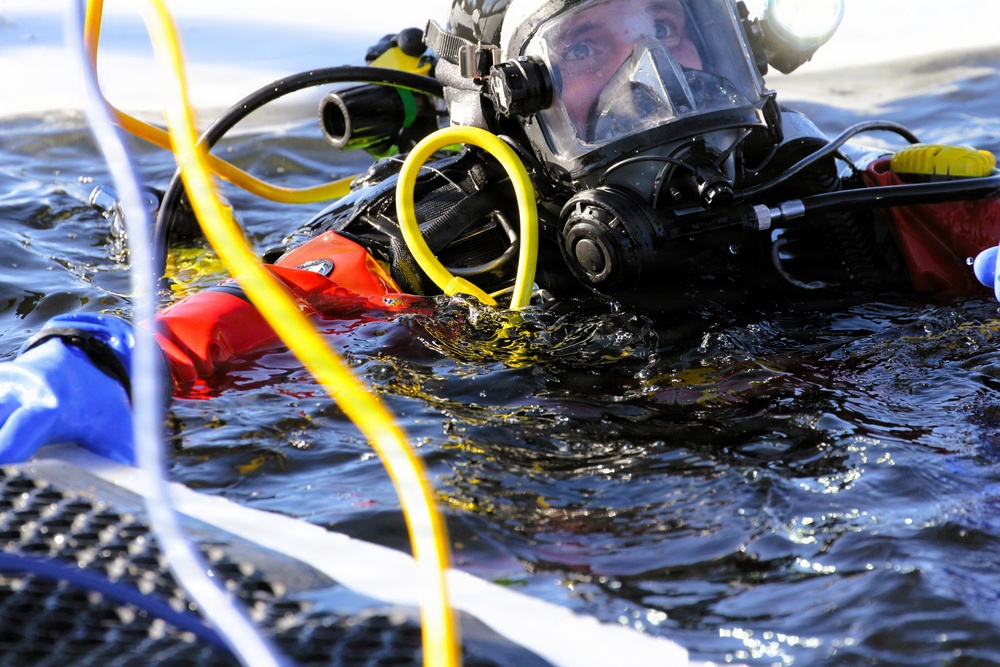Fort McCoy DES Fire Department dive team holds February rescue training under ice