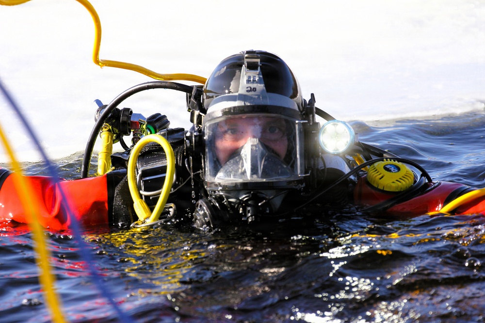 Fort McCoy DES Fire Department dive team holds February rescue training under ice