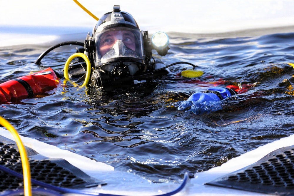 Fort McCoy DES Fire Department dive team holds February rescue training under ice