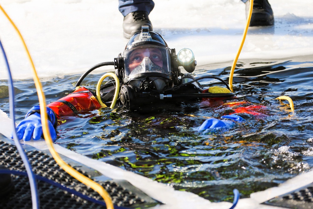 Fort McCoy DES Fire Department dive team holds February rescue training under ice