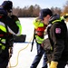 Fort McCoy DES Fire Department dive team holds February rescue training under ice