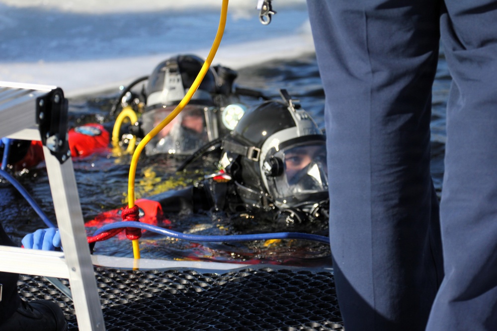 Fort McCoy DES Fire Department dive team holds February rescue training under ice