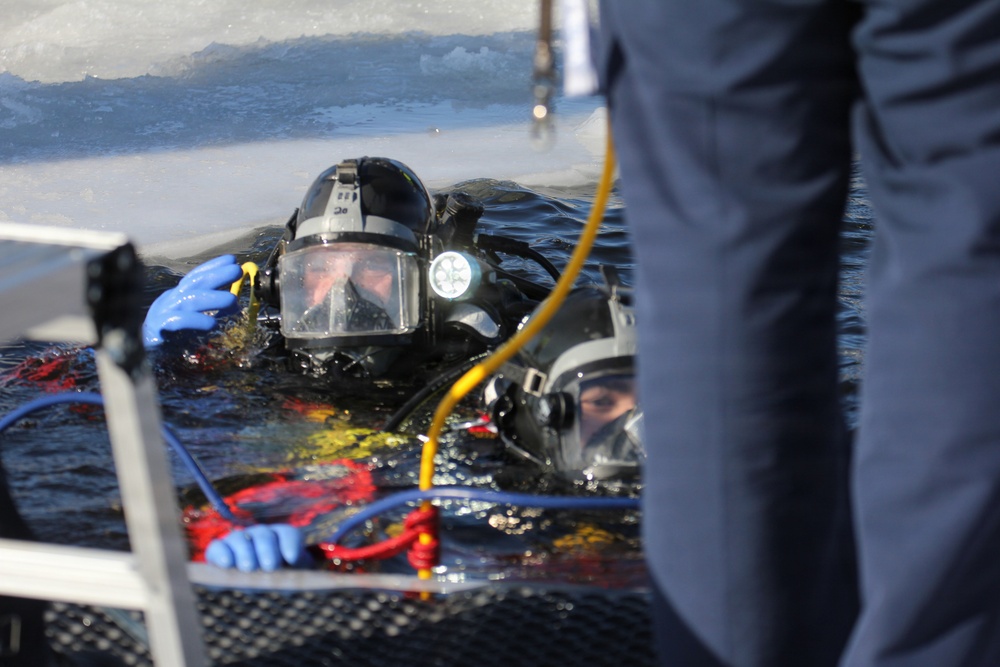 Fort McCoy DES Fire Department dive team holds February rescue training under ice