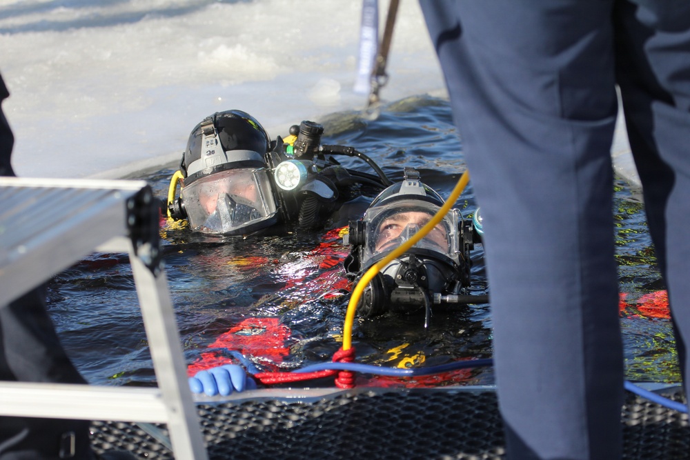 Fort McCoy DES Fire Department dive team holds February rescue training under ice