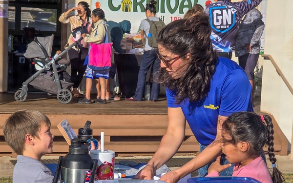 Pacific Missile Range Facility (PMRF) Volunteers at the S.T.R.E.A.M. Night at St. Theresa's Catholic School