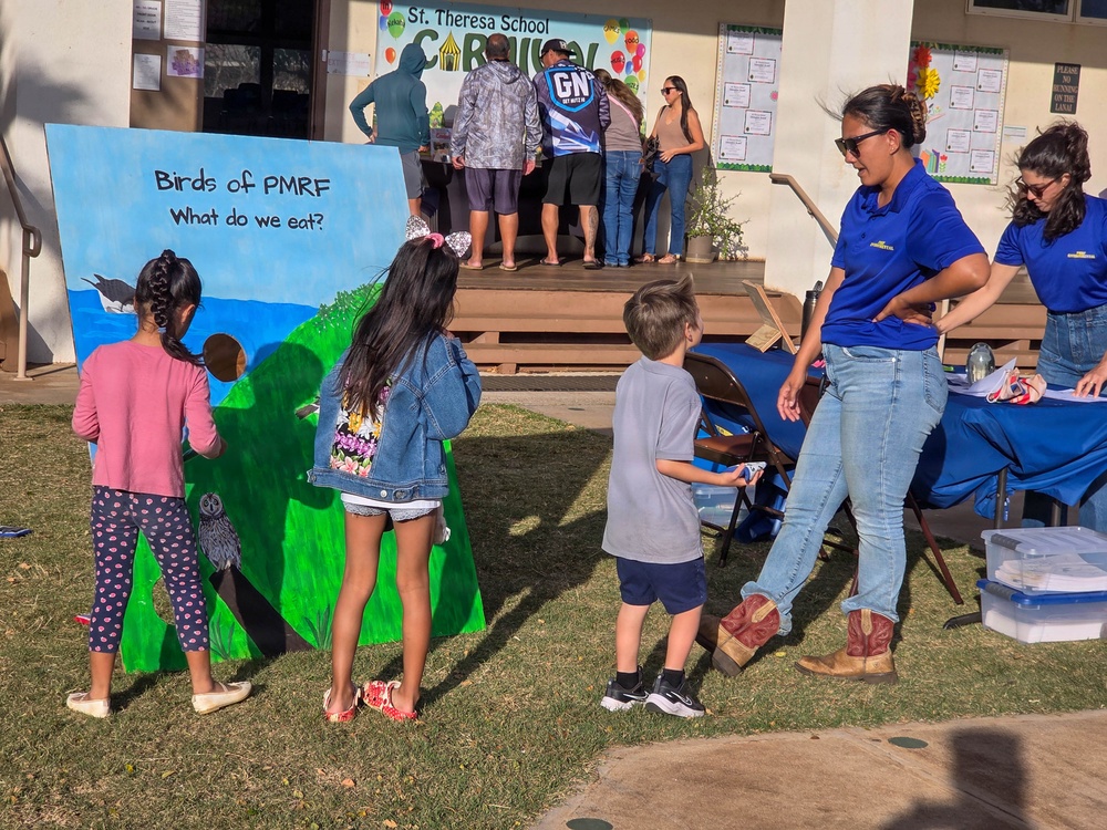 Pacific Missile Range Facility (PMRF) Volunteers at the S.T.R.E.A.M. Night at St. Theresa's Catholic School