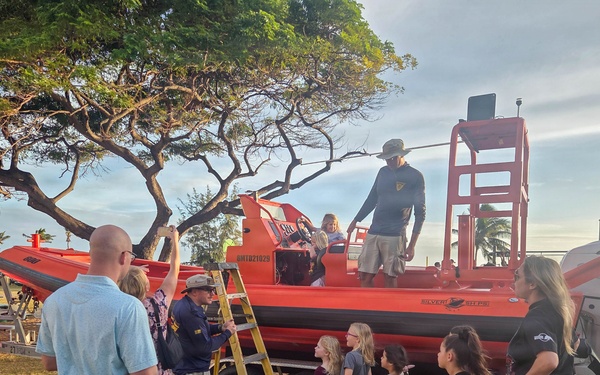 Pacific Missile Range Facility (PMRF) Volunteers at the S.T.R.E.A.M. Night at St. Theresa's Catholic School