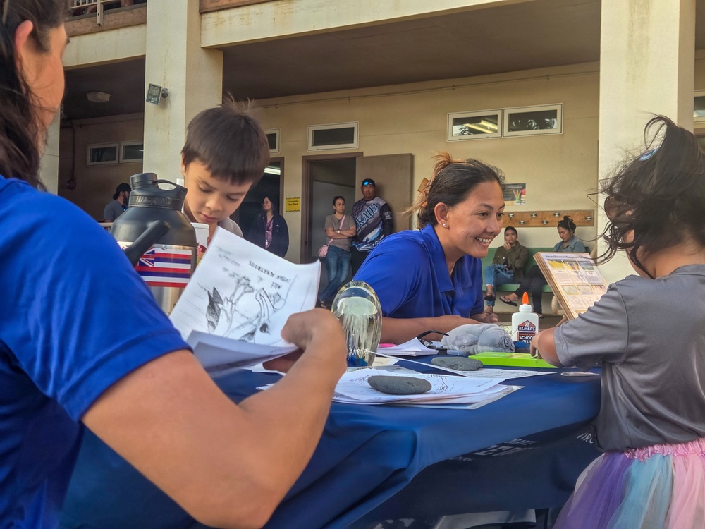 Pacific Missile Range Facility (PMRF) Volunteers at the S.T.R.E.A.M. Night at St. Theresa's Catholic School