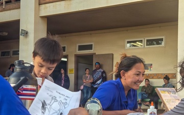 Pacific Missile Range Facility (PMRF) Volunteers at the S.T.R.E.A.M. Night at St. Theresa's Catholic School