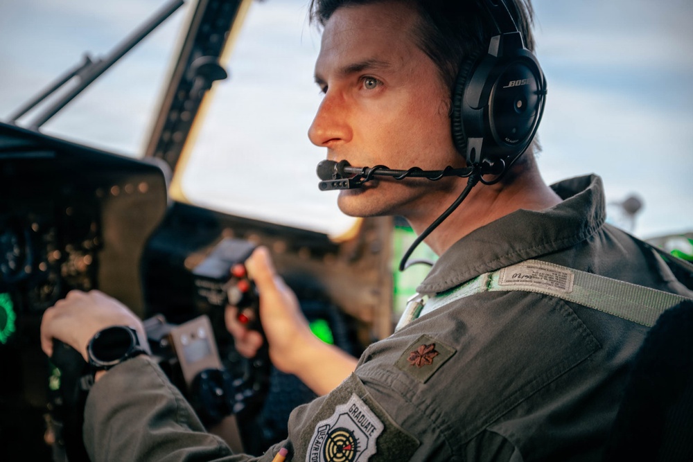 Pilot Scans Area During Escort Misson