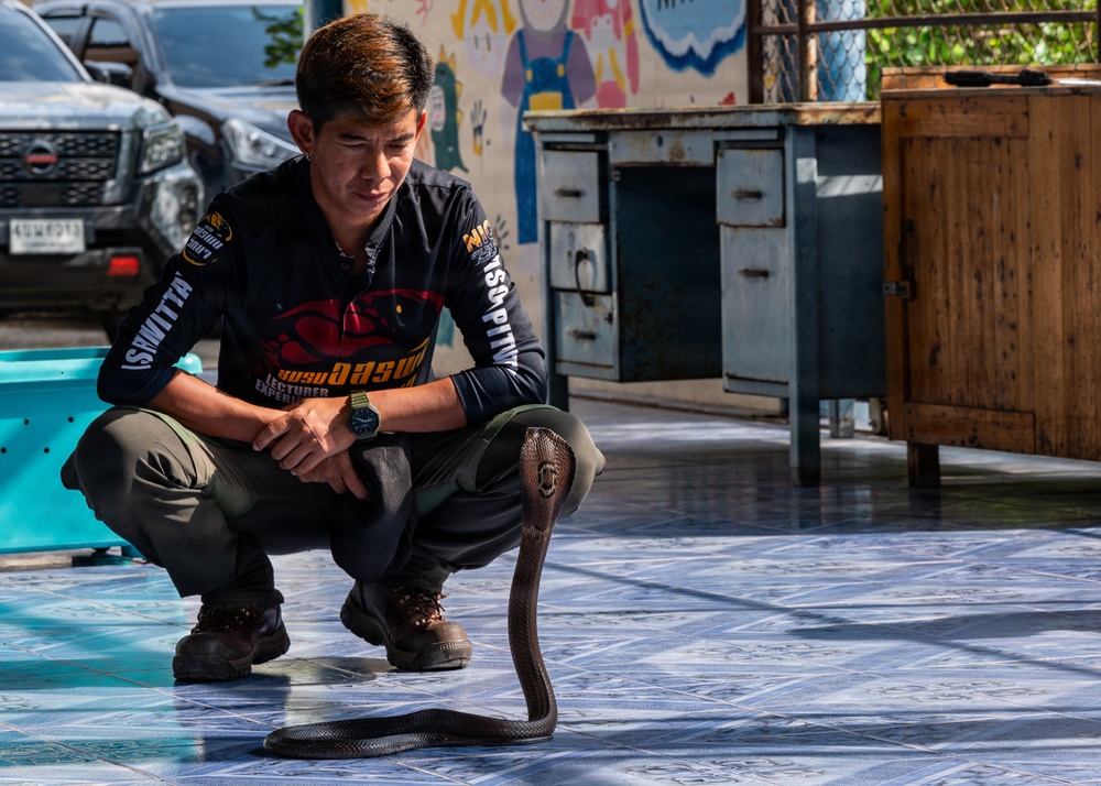 Students receive snake safety brief during Cobra Gold 45