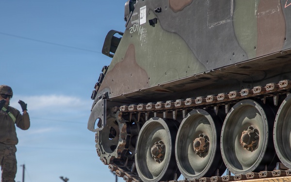 Rolling out: Iron Soldiers load armored power onto the rails