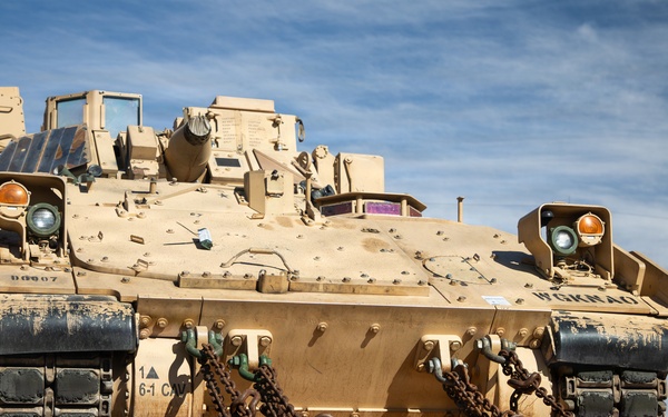 Rolling out: Iron Soldiers load armored power onto the rails