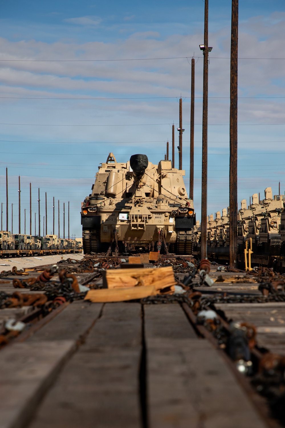 Rolling out: Iron Soldiers load armored power onto the rails