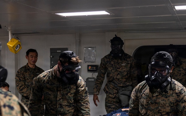 11th MEU Marines, Sailors Conduct CBRN Decontamination Training Aboard USS Boxer