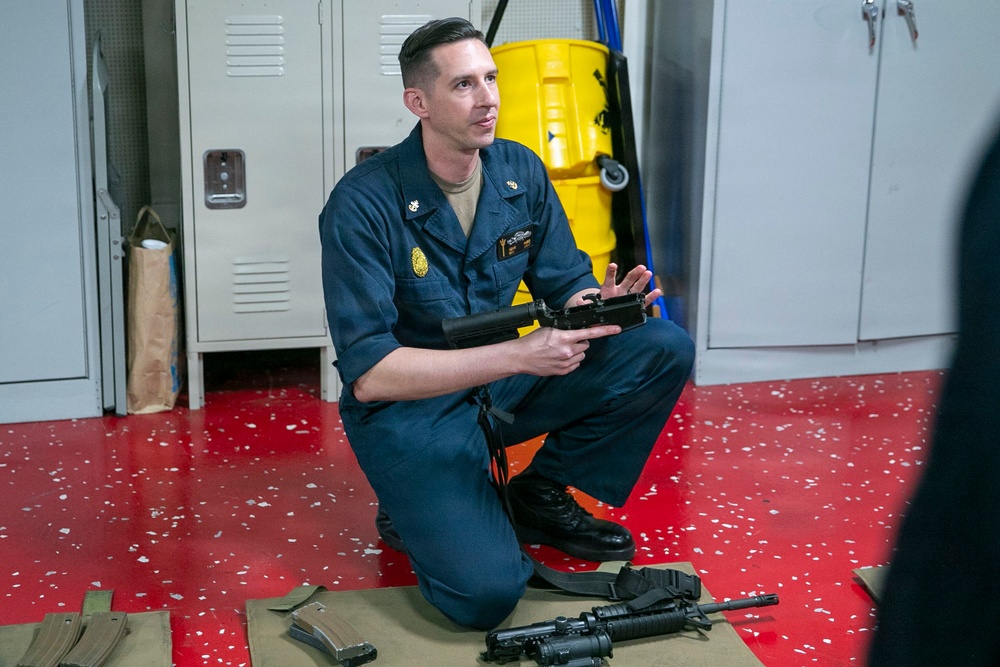 USS Tripoli Conducts An M4 Weapon Familiarization
