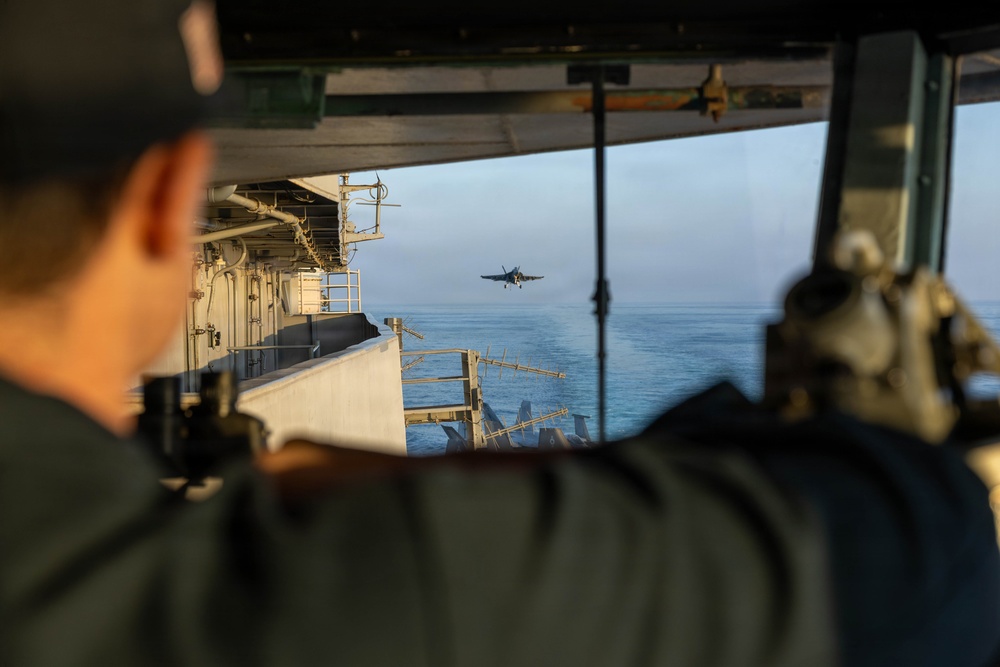 A U.S. Sailor observes flight operations in the pilothouse of Nimitz-class aircraft carrier USS Abraham Lincoln (CVN 72) in support of Operation Epic Fury, Feb. 28, 2026. (U.S. Navy photo)