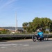 Sailors and Coast Guardsmen ride adaptive bicycles during timed trials