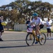 Sailors and Coast Guardsmen ride adaptive bicycles during timed trials