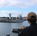 USS SHILOH Sailor observes her ship following underway onboard USS HOPPER