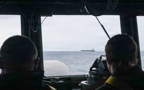 USS Paul Ignatius (DDG 117) works with the U.S. Coast Guard in the interdiction of the M/T Bella 1
