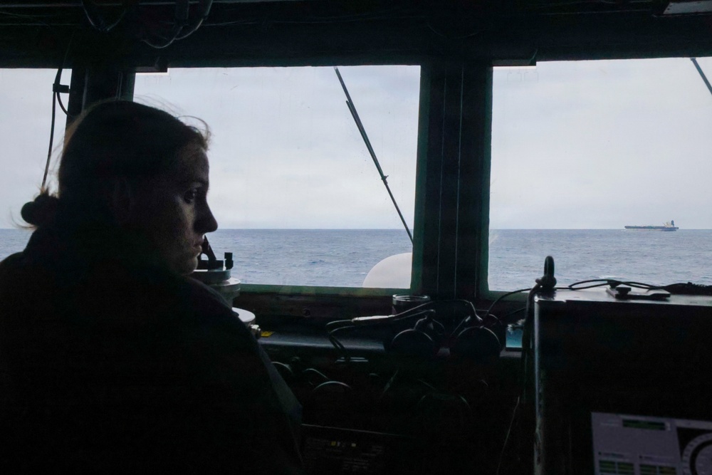 USS Paul Ignatius (DDG 117) works with the U.S. Coast Guard in the interdiction of the M/T Bella 1