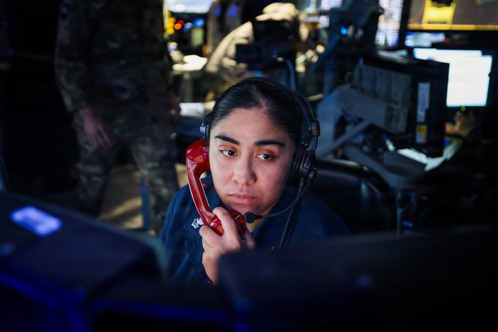 USS Paul Ignatius (DDG 117) works with the U.S. Coast Guard in the interdiction of the M/T Bella 1