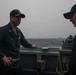 USS Paul Ignatius (DDG 117) works with the U.S. Coast Guard in the interdiction of the M/T Bella 1