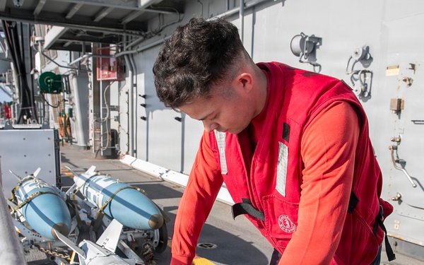 USS Tripoli Sailors Prepare Ordnance in “Bomb Farm”
