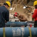 USS Tripoli Sailors Assemble Ordnance