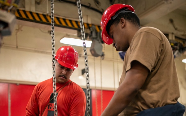 USS Tripoli Sailors Assemble Ordnance