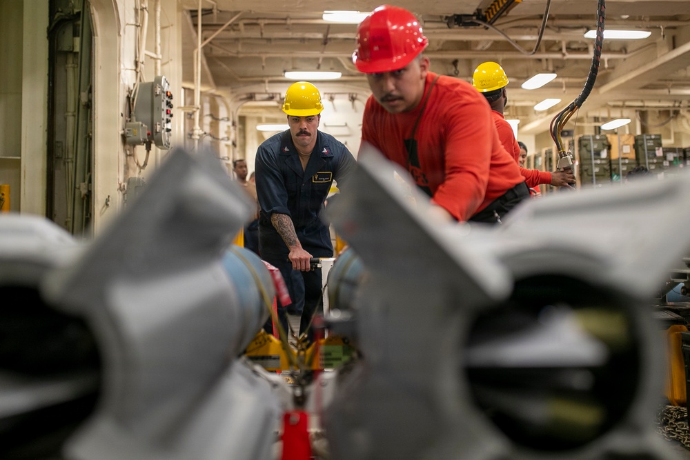 USS Tripoli Sailors Assemble Ordnance