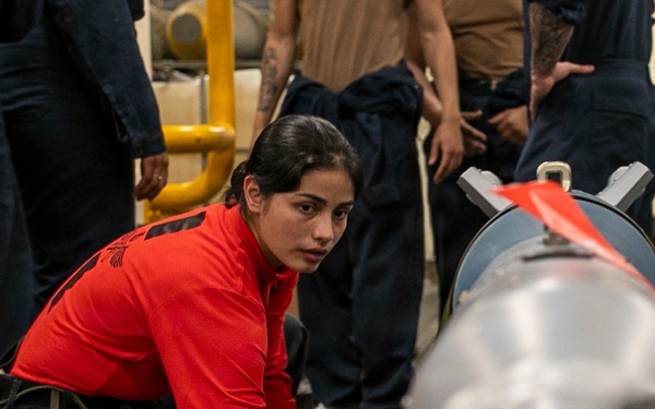 USS Tripoli Sailors Assemble Ordnance