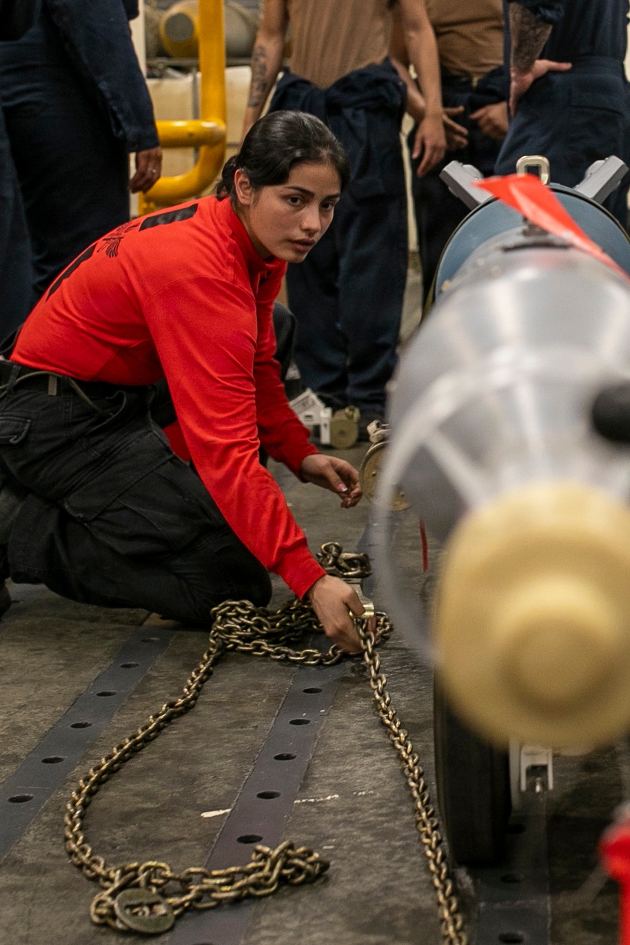 USS Tripoli Sailors Assemble Ordnance