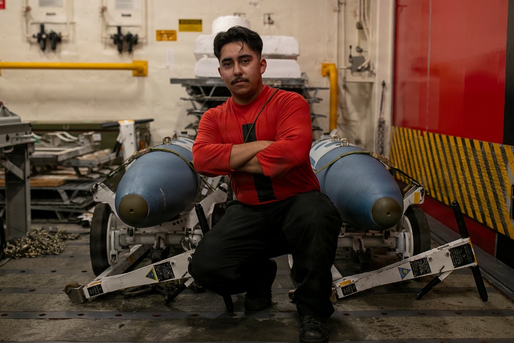 USS Tripoli Sailors Assemble Ordnance