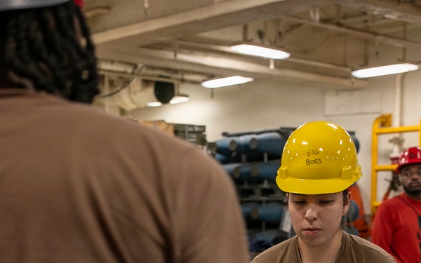 USS Tripoli Sailors Assemble Ordnance
