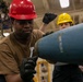 USS Tripoli Sailors Assemble Ordnance