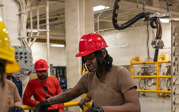 USS Tripoli Sailors Assemble Ordnance
