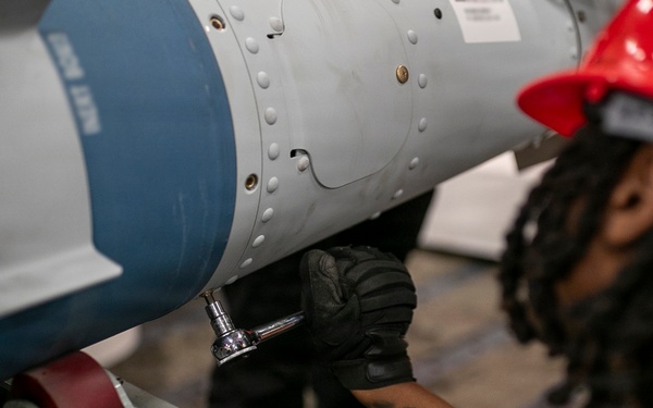 USS Tripoli Sailors Assemble Ordnance