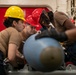 USS Tripoli Sailors Assemble Ordnance