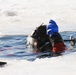 Fort McCoy firefighters practice diving under ice at post’s Big Sandy Lake during February 2026 training