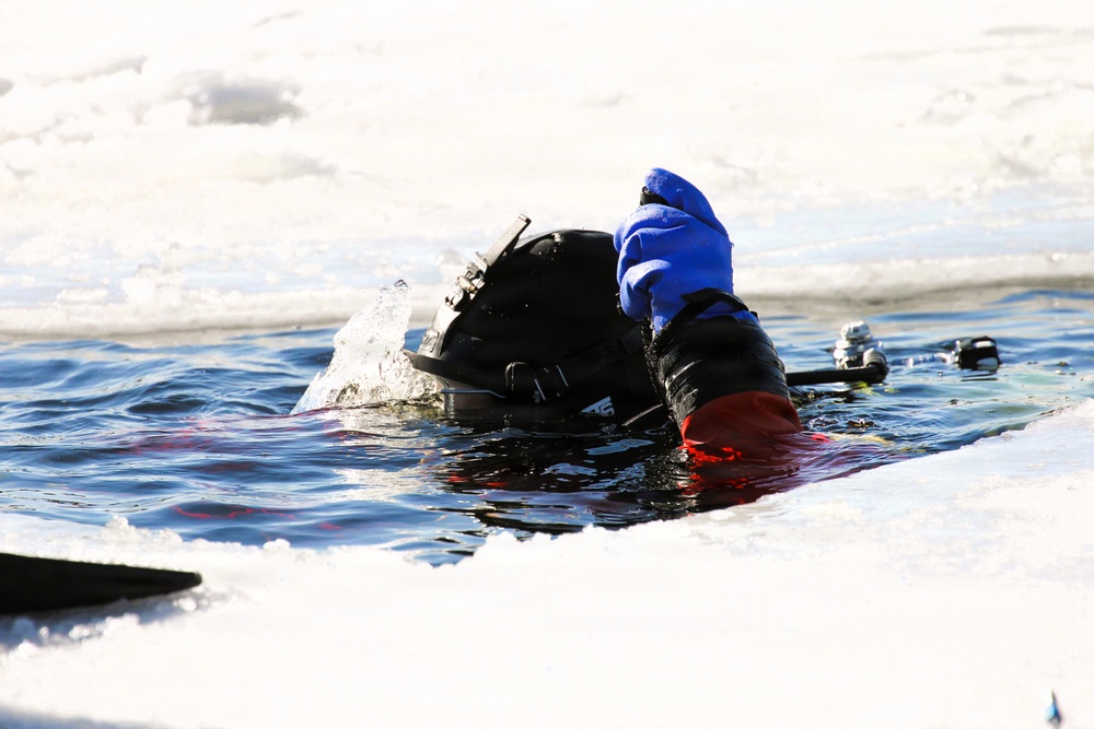 Fort McCoy firefighters practice diving under ice at post’s Big Sandy Lake during February 2026 training