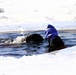 Fort McCoy firefighters practice diving under ice at post’s Big Sandy Lake during February 2026 training