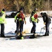 Fort McCoy firefighters practice diving under ice at post’s Big Sandy Lake during February 2026 training